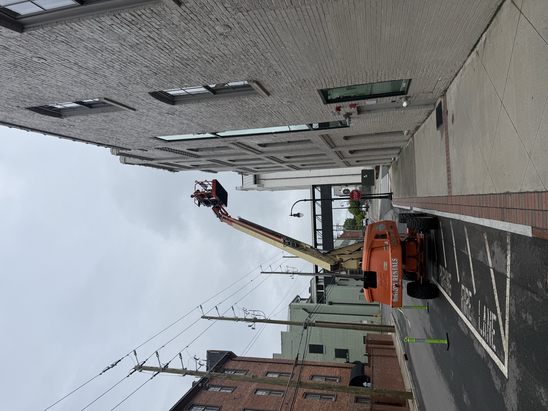 Downtown commercial building cleaning by Mayberry Pressure Washing
